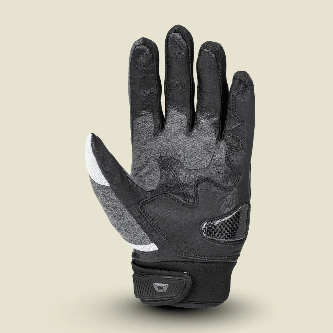 Men's Cortech Hyper-Flo 2.0 motorcycle gloves gripping handlebars, demonstrating flexibility and control.
